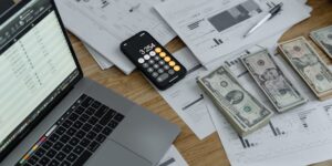 Person holding credit card making a decision